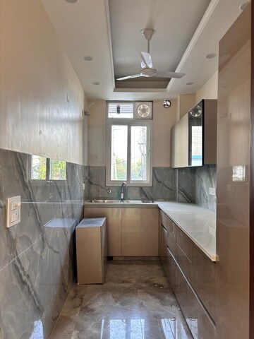 Kitchen in 4 BHK Builder Floor at Sainik Plaza, Sector 49 – for Sale