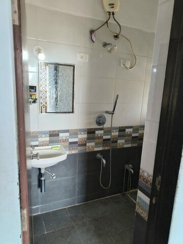 Bathroom in 1 BHK Apartment at Rajaram Sukur Enclave D Wing, Ghodbunder Road – for Sale