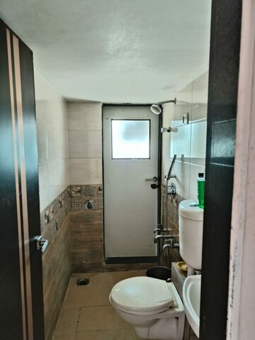 Bathroom in 1 BHK Apartment at Rajaram Sukur Enclave D Wing, Ghodbunder Road – for Sale
