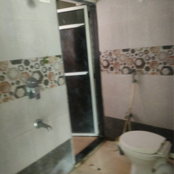 Living Room in 1 BHK Apartment at Chandrahas CHS, Rbi Colony – for Sale