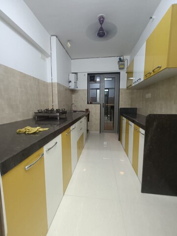 Kitchen in 3 BHK Apartment at Adani Western Heights Sky Apartments, Andheri West – for Rent