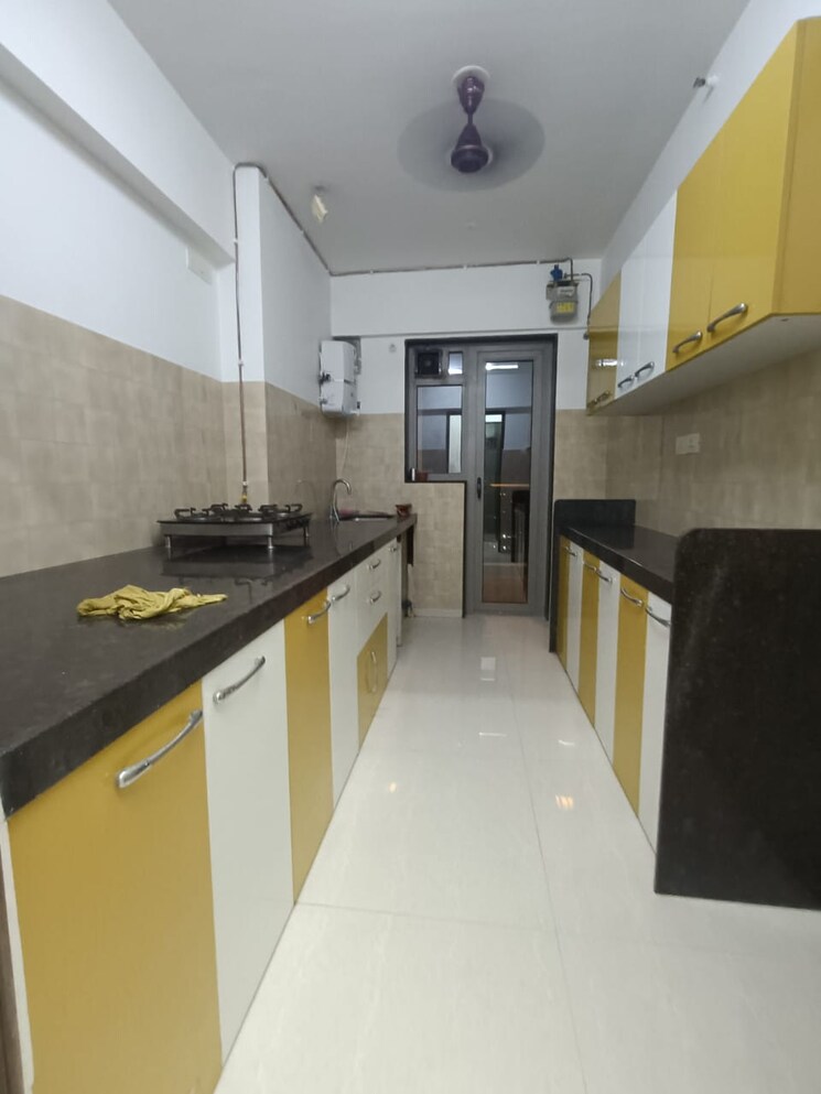 Kitchen, adani-western-heights-sky-apartments 3 Bedroom 1924 Sq.Ft. Apartment In Andheri West Mumbai 7159856