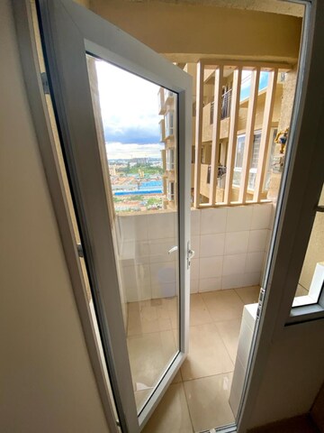 Balcony in 1 BHK Apartment at Bhartiya Nikoo Homes, Thanisandra Main Road – for Sale