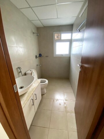 Bathroom in 1 BHK Apartment at Bhartiya Nikoo Homes, Thanisandra Main Road – for Sale