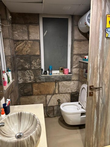 Bathroom in 3 BHK Apartment at Orchid Petals, Sector 49 – for Sale