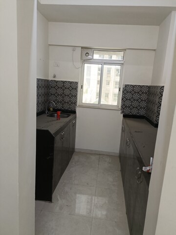 Kitchen in 1 BHK Apartment at Lodha Amara, Kolshet Road – for Sale