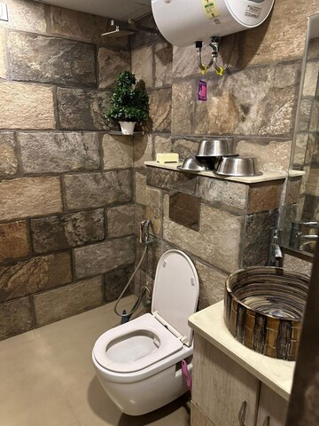 Bathroom in 4 BHK Apartment at Orchid Petals, Sector 49 – for Sale