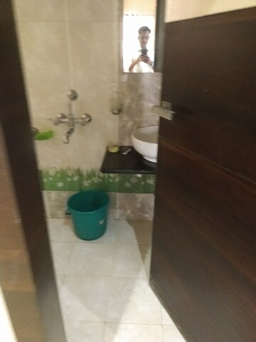 Bathroom in 5 BHK Apartment at Rajasthan CHS, Andheri East – for Sale