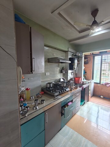 Kitchen in 2 BHK Apartment at Hitakshi Height, Mira Road – for Sale