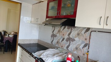 Kitchen in 2 BHK Apartment at Gokul Nagari NX CHS, Kalyan West – for Sale