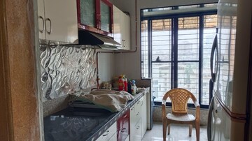 Kitchen in 2 BHK Apartment at Gokul Nagari NX CHS, Kalyan West – for Sale