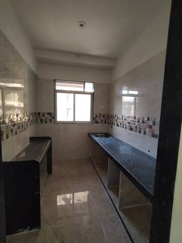 Kitchen in 2 BHK Apartment at Kohinoor Lifestyle, Kalyan West – for Sale