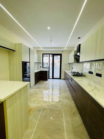 Kitchen in 4 BHK Builder Floor at Ansal API Versalia, Sector 67a – for Sale