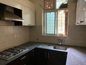 Kitchen in 3.5 BHK Builder Floor at Ansal API Esencia, Sector 67 – for Sale