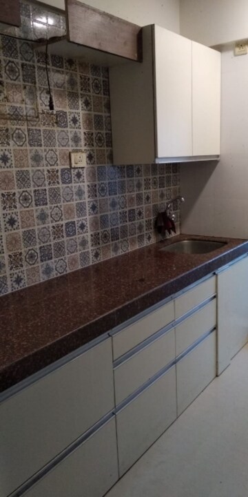 Kitchen in 2 BHK Apartment at Mahim East – for Sale