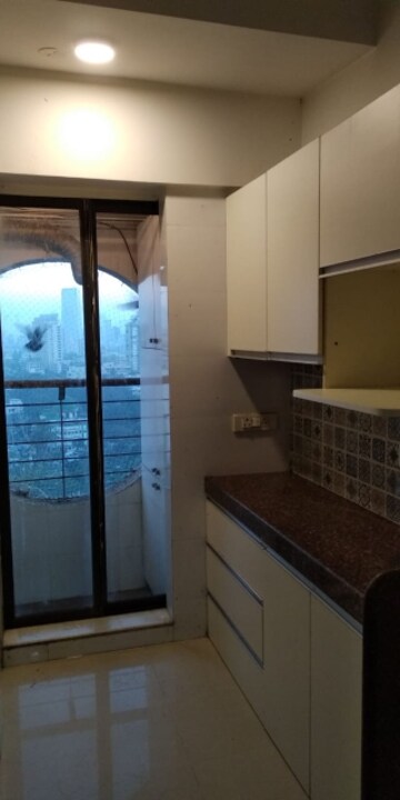 Kitchen in 2 BHK Apartment at Mahim East – for Sale