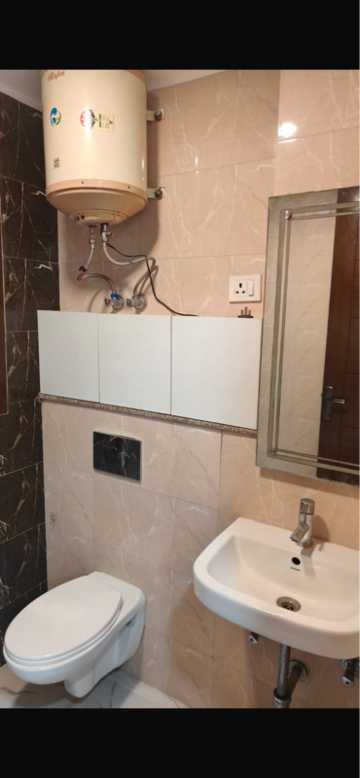 Bathroom in 2 BHK Builder Floor at Chattarpur – for Sale