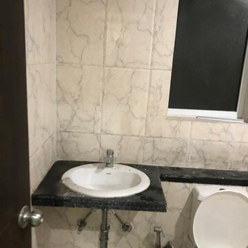 Bathroom in 2.5 BHK Apartment at Mahagun Mirabella, Sector 79 – for Sale