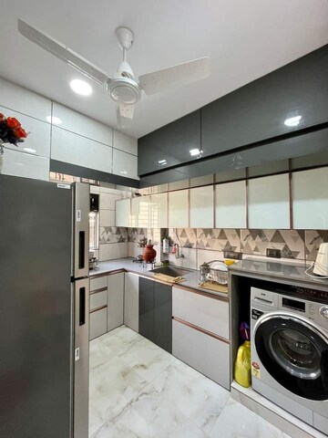 Kitchen in 3 BHK Apartment at Arham Satyam Valencia, Kharghar – for Sale