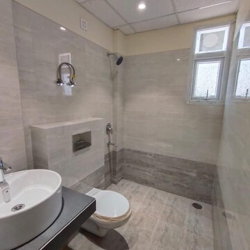 Bathroom in 3 BHK Apartment at Dhakoli Village – for Sale