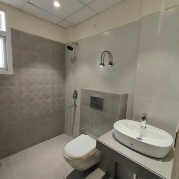 Bathroom in 3 BHK Apartment at Dhakoli Village – for Sale