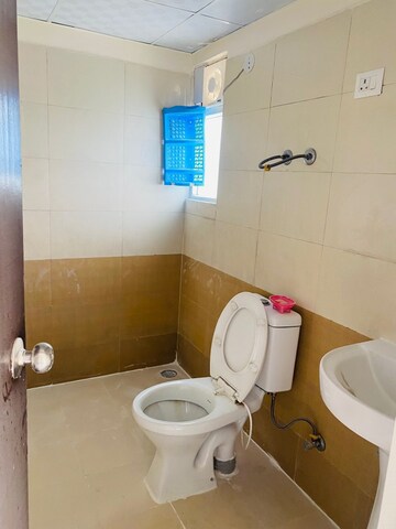 Bathroom in 3 BHK Apartment at Uninav Heights Phase I, Raj Nagar Extension – for Sale