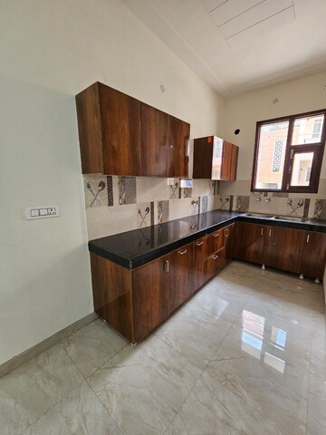 Kitchen in 3 BHK Apartment at Dhakoli Village – for Sale