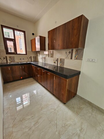 Kitchen in 3 BHK Apartment at Dhakoli Village – for Sale
