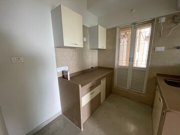 Kitchen in 1.5 BHK Apartment at Dosti West County Phase 4 Dosti Pine, Balkum Pada – for Sale