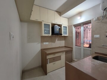 Kitchen in 1.5 BHK Apartment at Dosti West County, Balkum Pada – for Sale