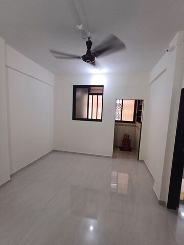 Living Room in 1 BHK Apartment at Om Sudama CHS, Kalwa – for Sale