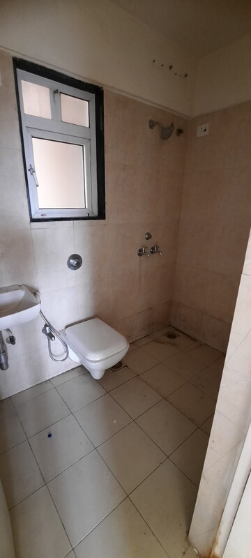 Bathroom in 1 BHK Apartment at Puranik Rumah Bali, Ghodbunder Road – for Sale