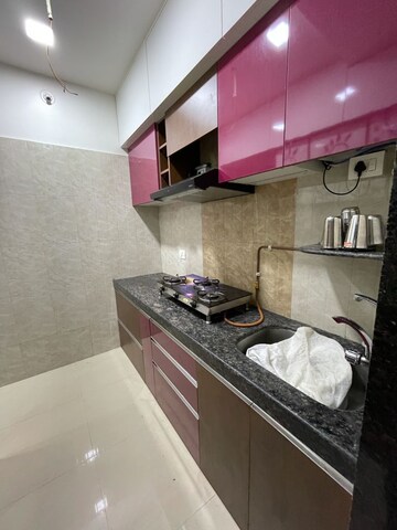 Kitchen in 2 BHK Apartment at Leena Bhairav Residency, Mira Road – for Sale