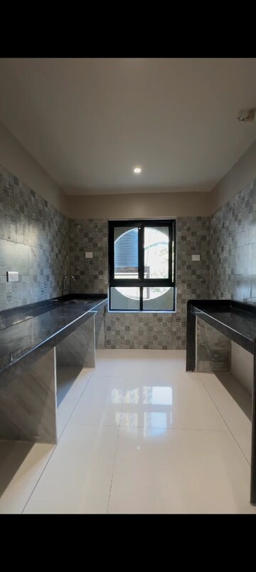 Kitchen in 2 BHK Apartment at Tharwani Ariana Phase II, Ambernath – for Sale