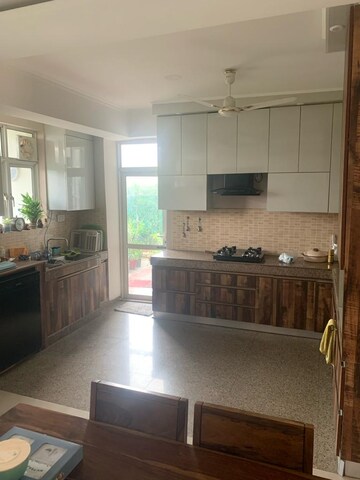 Kitchen in 4 BHK Apartment at Raheja Sampada, Sector 92 – for Sale