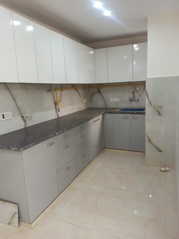 Kitchen in 4 BHK Builder Floor at Rajpur Khurd Extension – for Sale