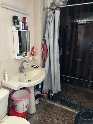 Bathroom in 2.5 BHK Apartment at Saviour Greenisle, Sain Vihar – for Sale