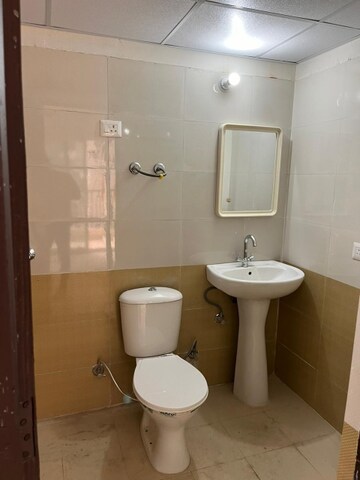 Bathroom in 2.5 BHK Apartment at Devika Skypers, Raj Nagar Extension – for Sale