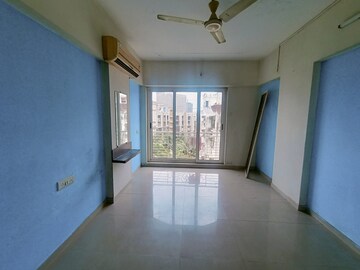 Room in 2 BHK Apartment at Astor Place CHS, Kandivali West – for Sale
