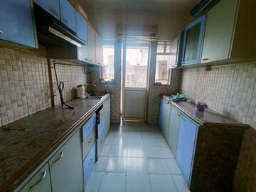 Kitchen in 2 BHK Apartment at Astor Place CHS, Kandivali West – for Sale