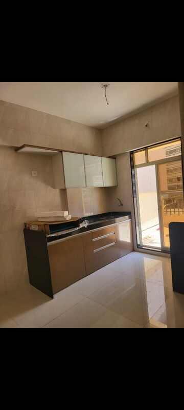 Kitchen in 1 BHK Apartment at Agarwal Paramount, Virar West – for Sale