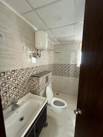 Bathroom in 2 BHK Apartment at Shreeji Tower, Panchsheel Nagar – for Sale