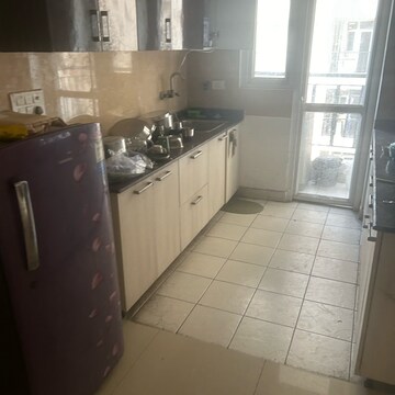 Kitchen in 3 BHK Apartment at Amrapali Princely Estate, Sector 76 – for Sale