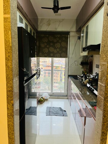 Kitchen in 2 BHK Apartment at Satyam Harmony Kopar Khairane, Kopar Khairane – for Sale