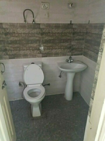 Bathroom in 2.5 BHK Apartment at Gulmohur Garden, Raj Nagar Extension – for Sale