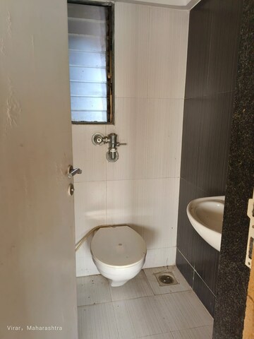 Bathroom in 1 BHK Apartment at Rustomjee Global City, Virar West – for Sale