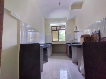 Kitchen in 2 BHK Apartment at Rustomjee Global City, Virar West – for Sale