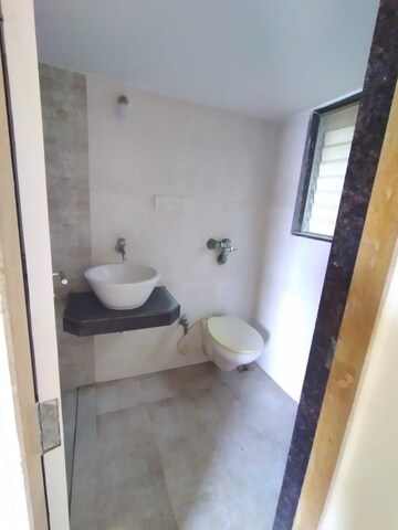 Bathroom in 2 BHK Apartment at Rustomjee Global City, Virar West – for Sale