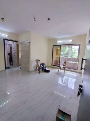Living Room in 2 BHK Apartment at Rustomjee Global City, Virar West – for Sale