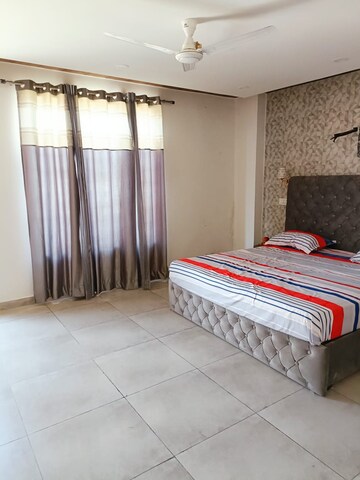 Bedroom in 4 BHK Penthouse at Dhakoli Village – for Sale